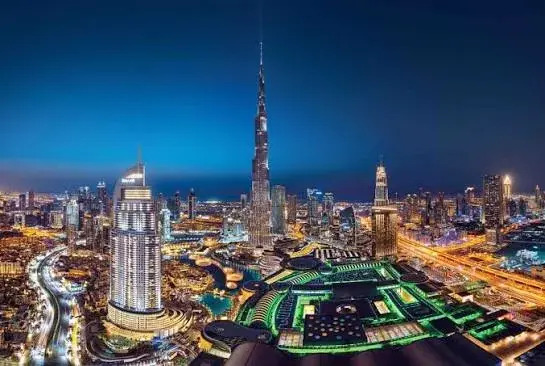 Aerial night view of Burj Khalifa, The Address Downtown, and Dubai Fountain
